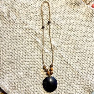 Neckless from Brazil made out coconut shell.